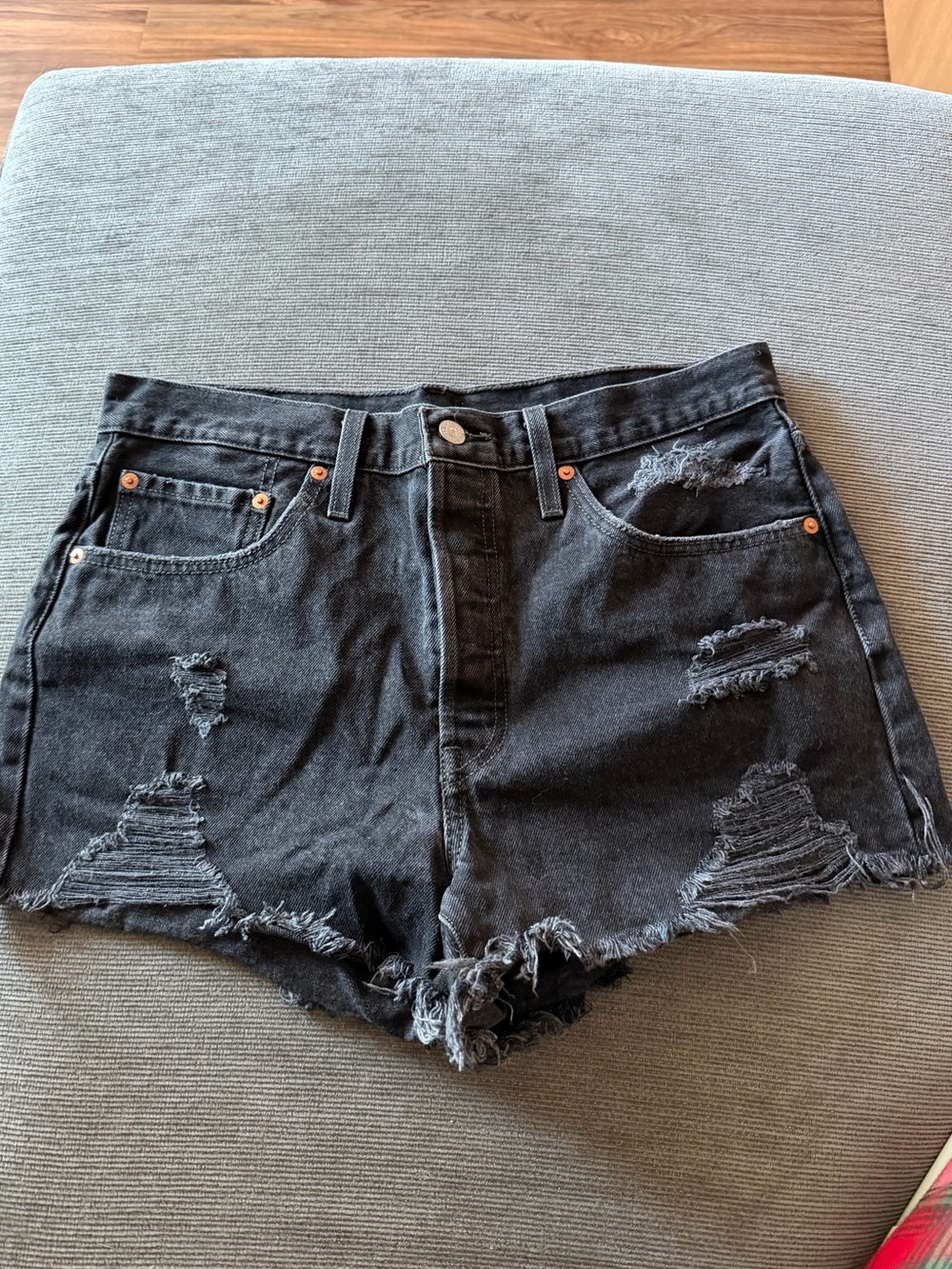 Levi’s High-Rise Distressed Black Denim Shorts